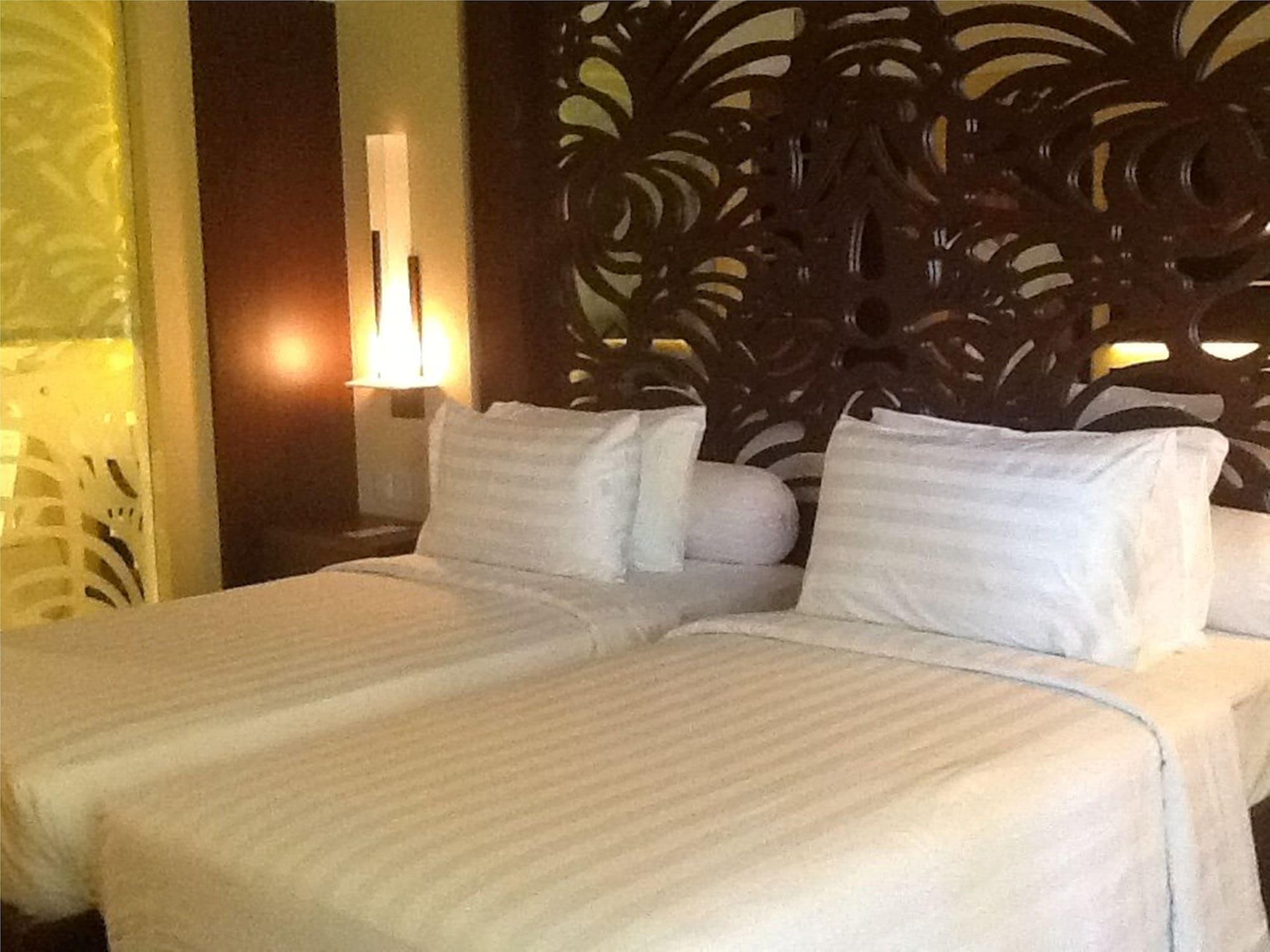 Prama Sanur Beach Bali Kültér fotó A bedroom at the hotel